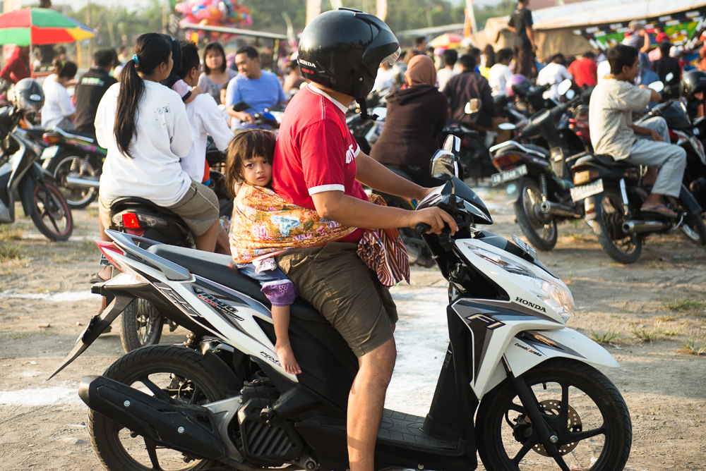 kid on motorbike no helmet